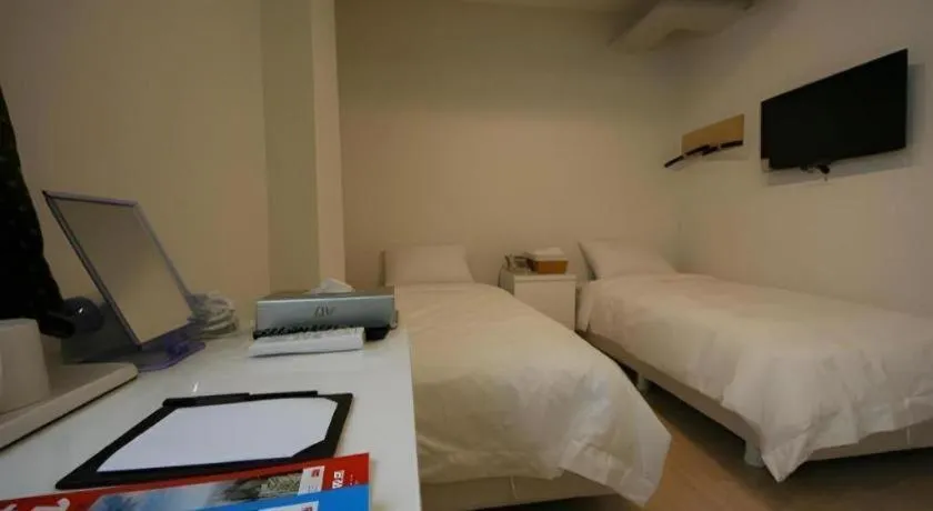 Bed in Wons Ville Myeongdong Hotel