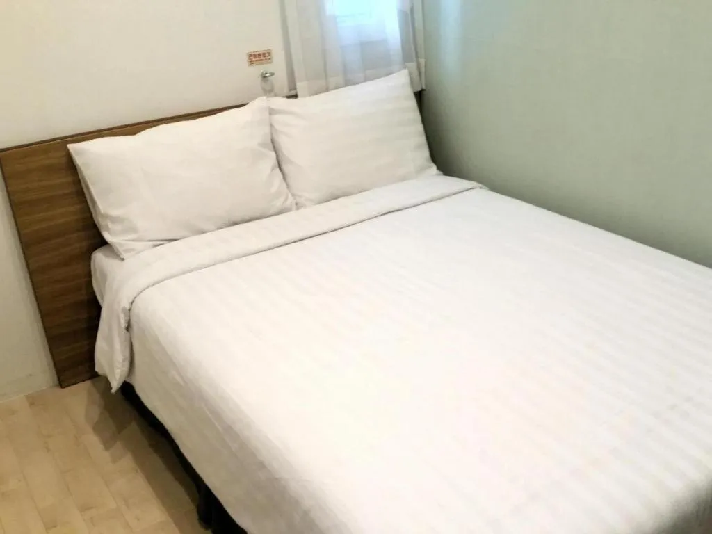 Bed in Wons Ville Myeongdong Hotel