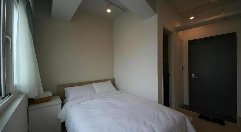 Bed in Wons Ville Myeongdong Hotel