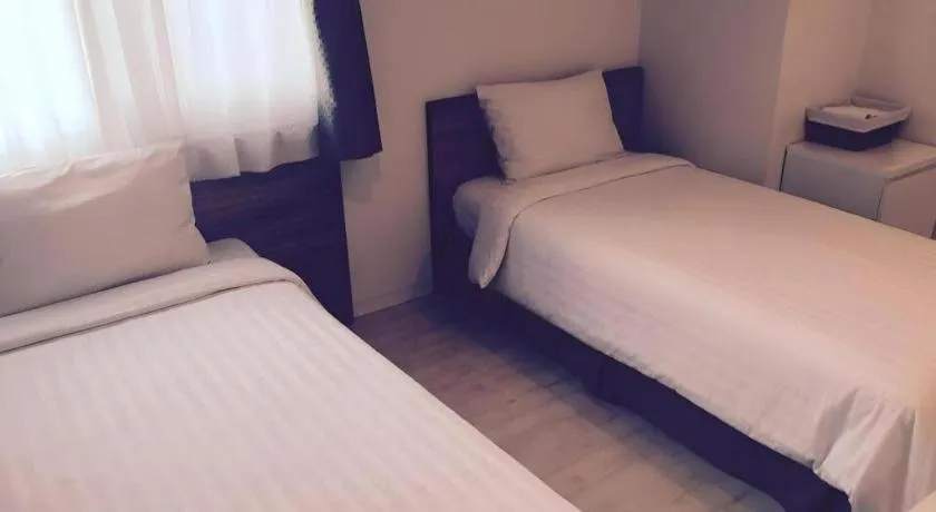 Bed in Wons Ville Myeongdong Hotel