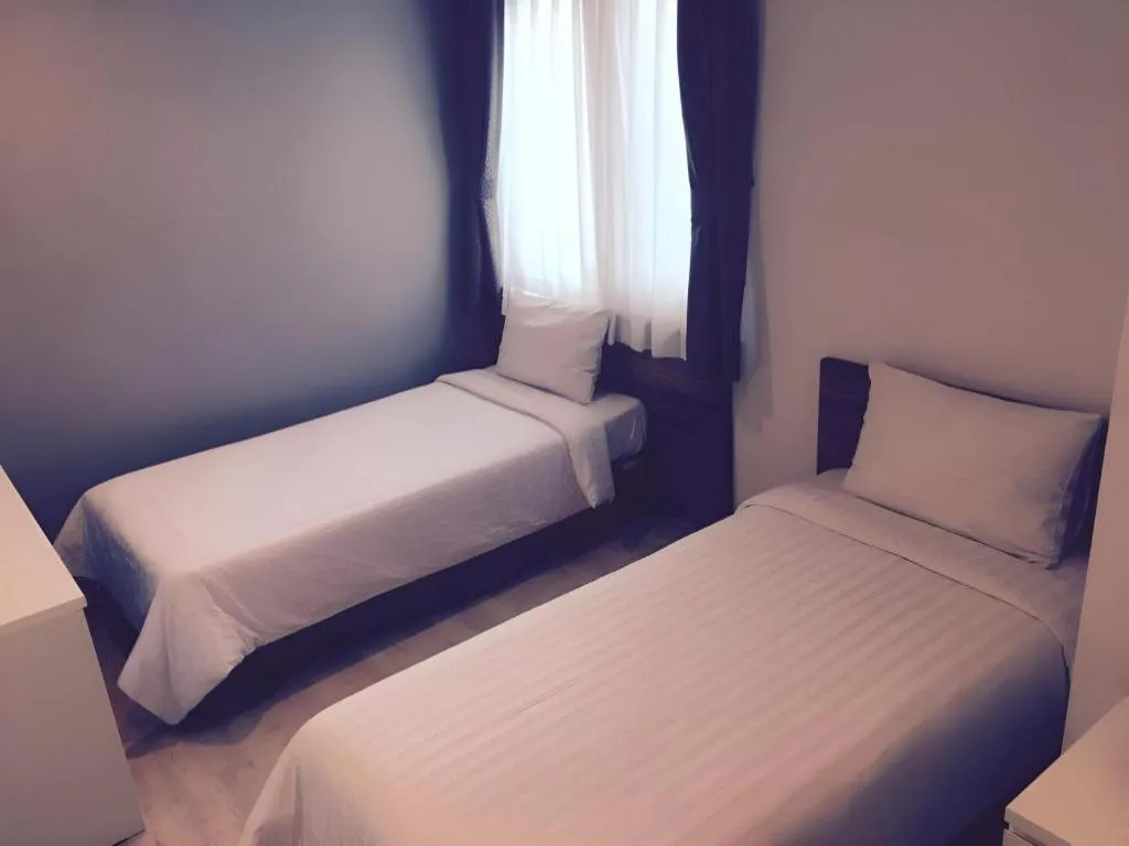 Bed in Wons Ville Myeongdong Hotel