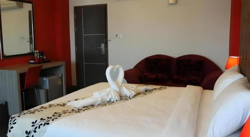 Bed in Chariot Pattaya Hotel