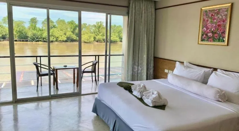 Bed in Nopparat Garden Hotel