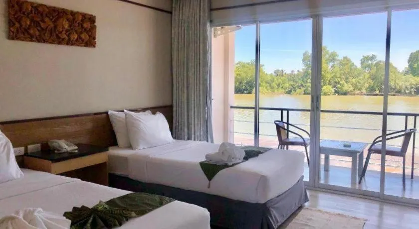 Bed in Nopparat Garden Hotel