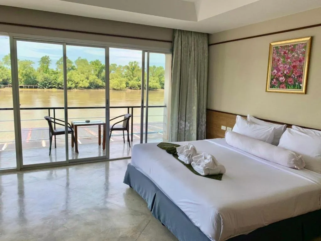 Bed in Nopparat Garden Hotel