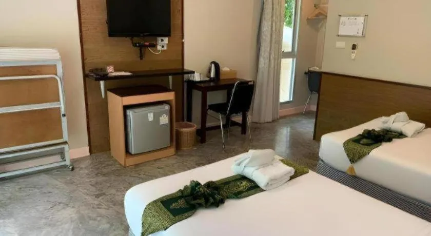 Bed in Nopparat Garden Hotel