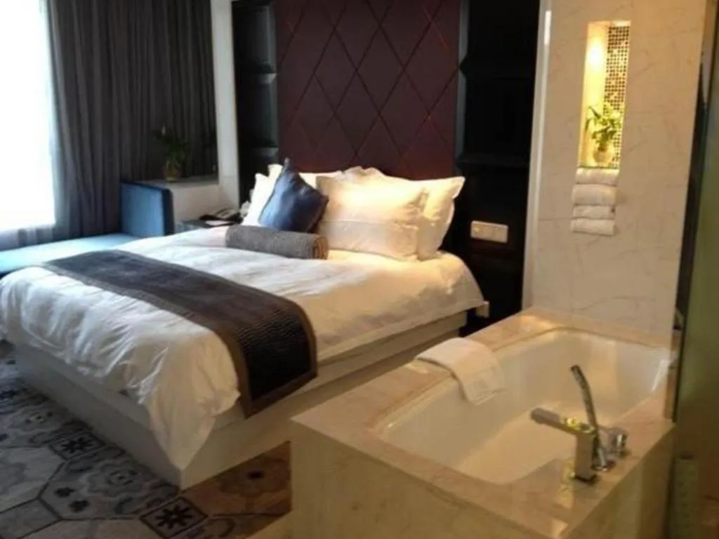 Bed in Wuyang Holiday Hotel Hangzhou