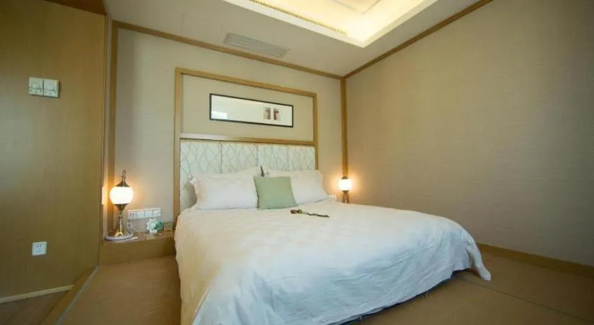 Bed in Wuyang Holiday Hotel Hangzhou