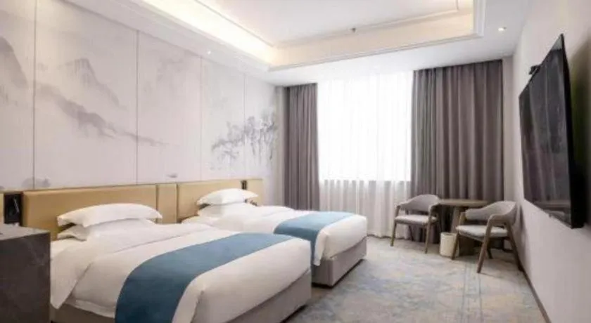 Bed in Nanning Yongjiang Hotel