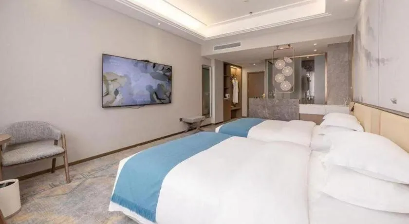 Bed in Nanning Yongjiang Hotel