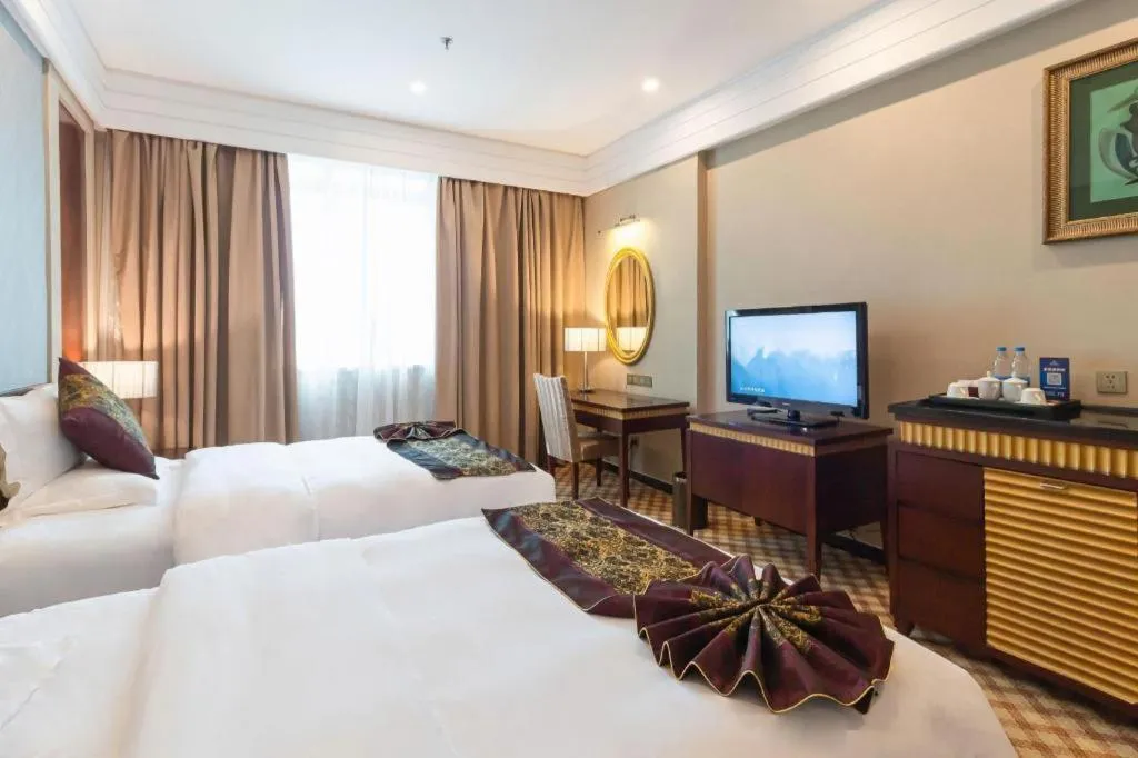 Bed in Nanning Yongjiang Hotel