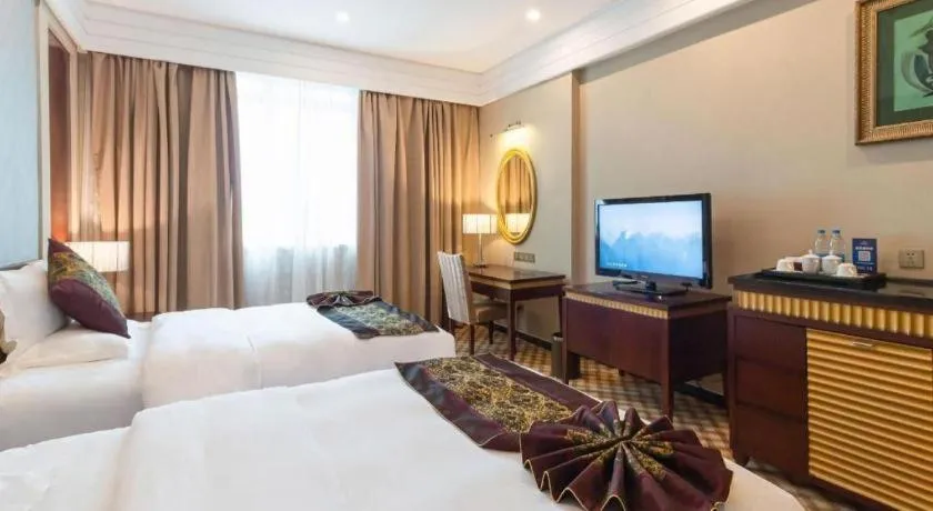 Bed in Nanning Yongjiang Hotel