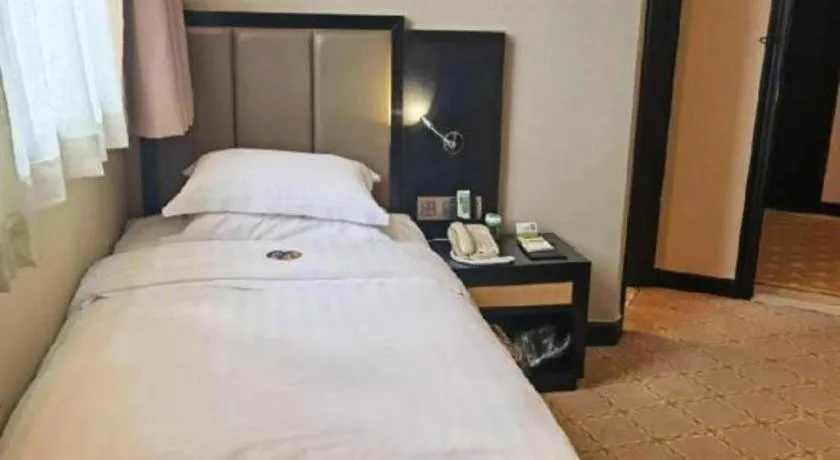 Bed in Nanning Yongjiang Hotel