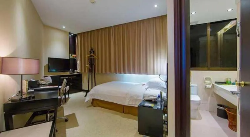 Bed in Nanning Yongjiang Hotel