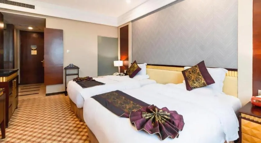 Bed in Nanning Yongjiang Hotel