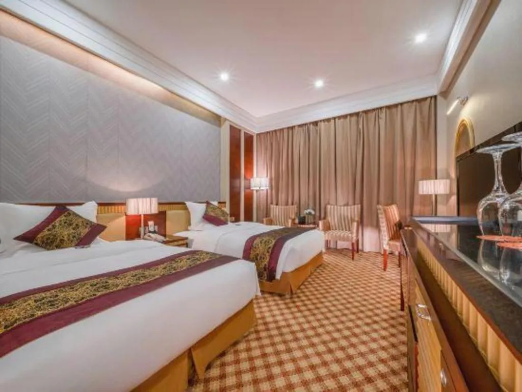 Bed in Nanning Yongjiang Hotel