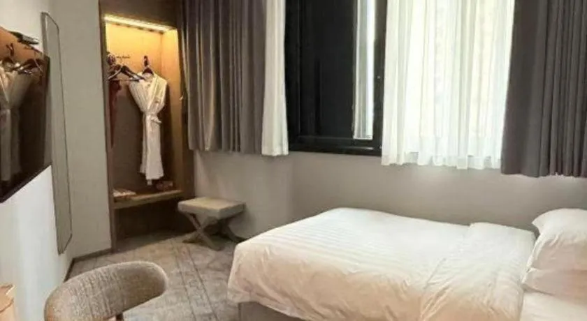 Bed in Nanning Yongjiang Hotel