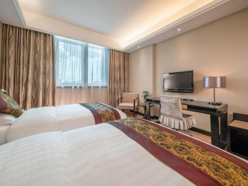 Bed in Nanning Yongjiang Hotel