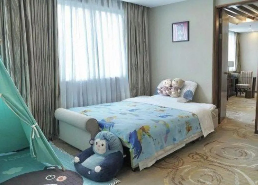 Bed in Nanning Yongjiang Hotel