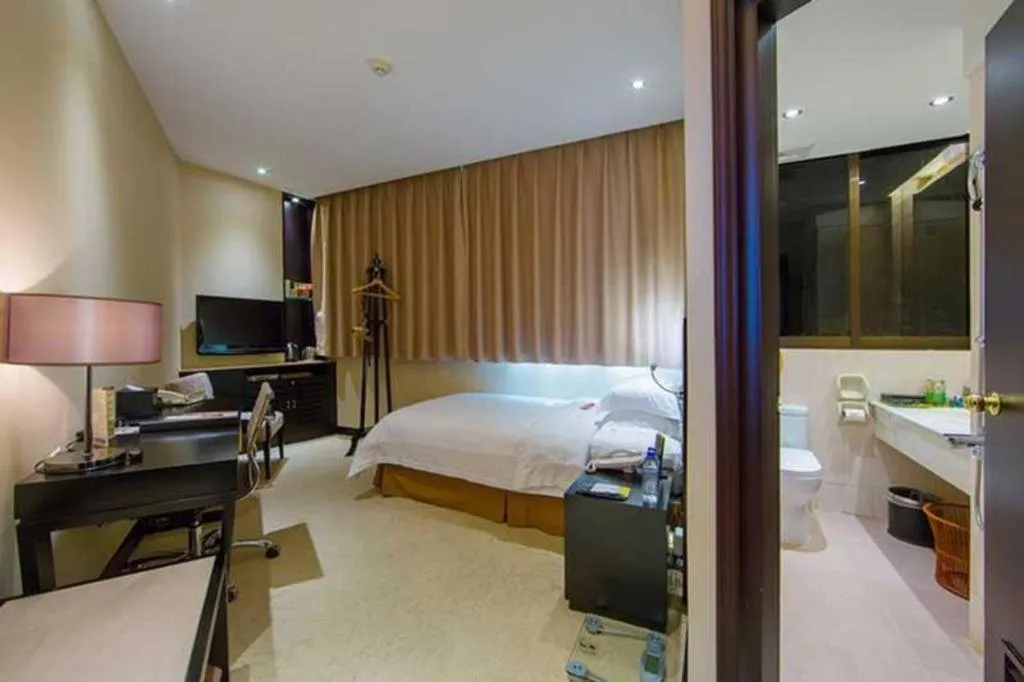 Bed in Nanning Yongjiang Hotel