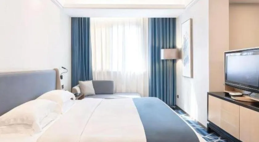 Bed in Nanning Yongjiang Hotel