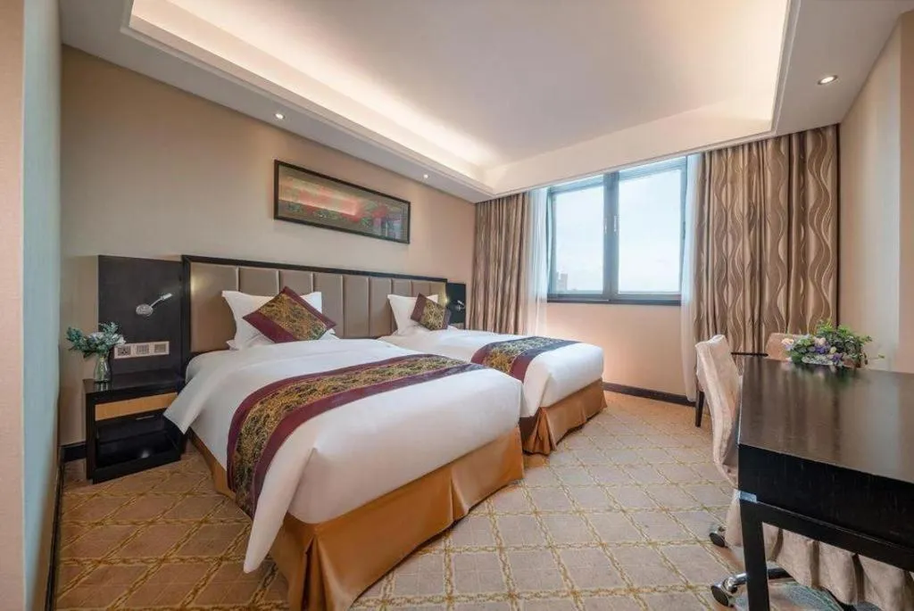 Bed in Nanning Yongjiang Hotel