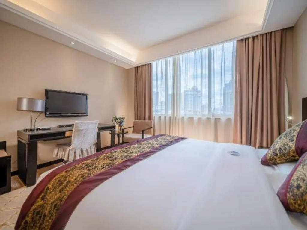 Bed in Nanning Yongjiang Hotel