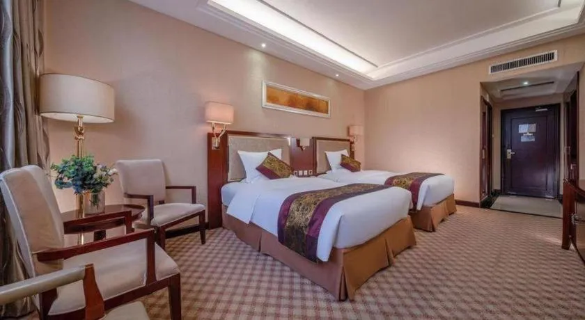 Bed in Nanning Yongjiang Hotel