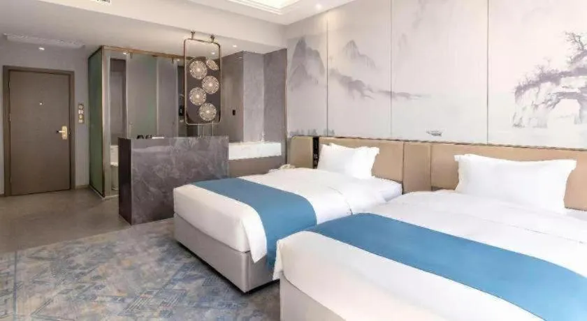 Bed in Nanning Yongjiang Hotel