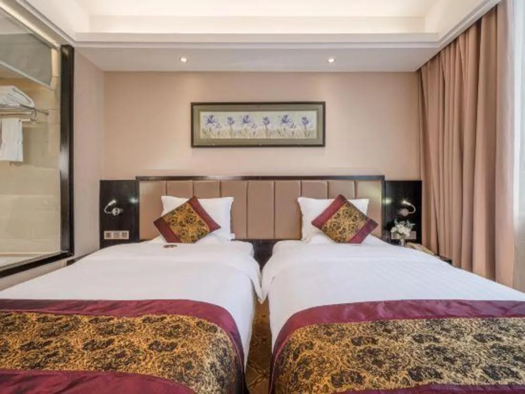 Bed in Nanning Yongjiang Hotel