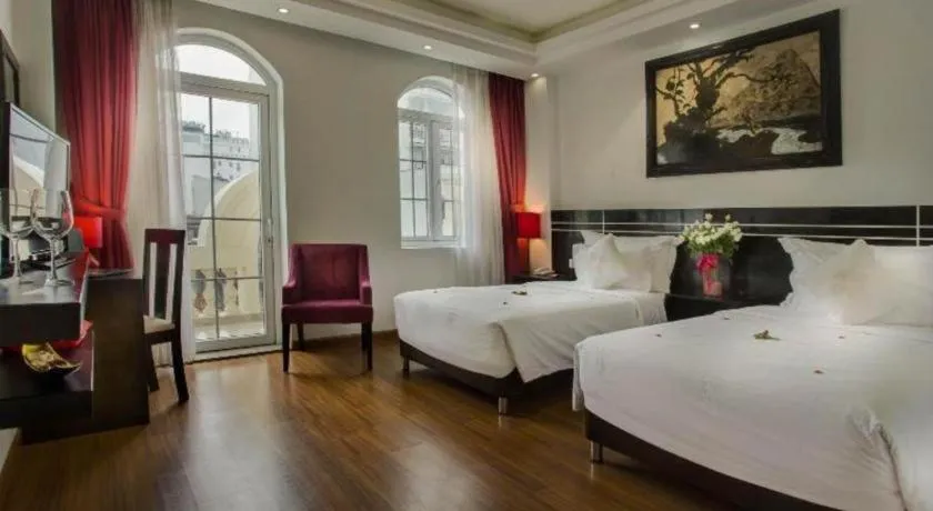 Bed in Hotel Des Arts – The Noble