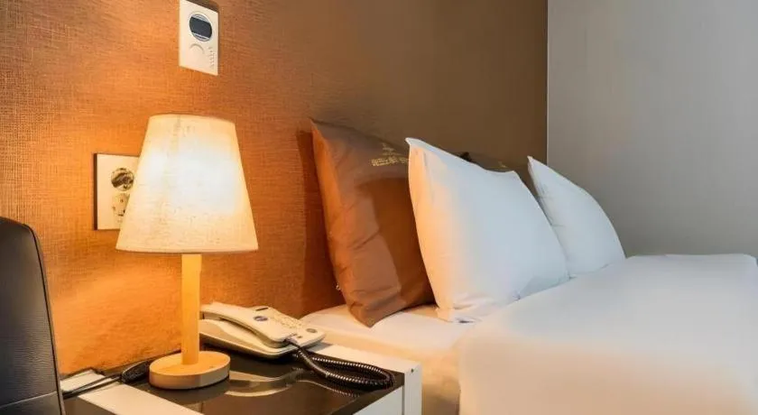 Bed in BENIKEA Technovalley Hotel