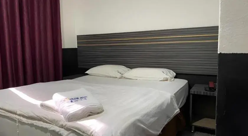 Bed in Darlene Hotel Bed in Darlene Hotel