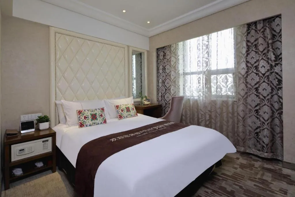 Bed in Nanjing Grand Da Qiao Hotel