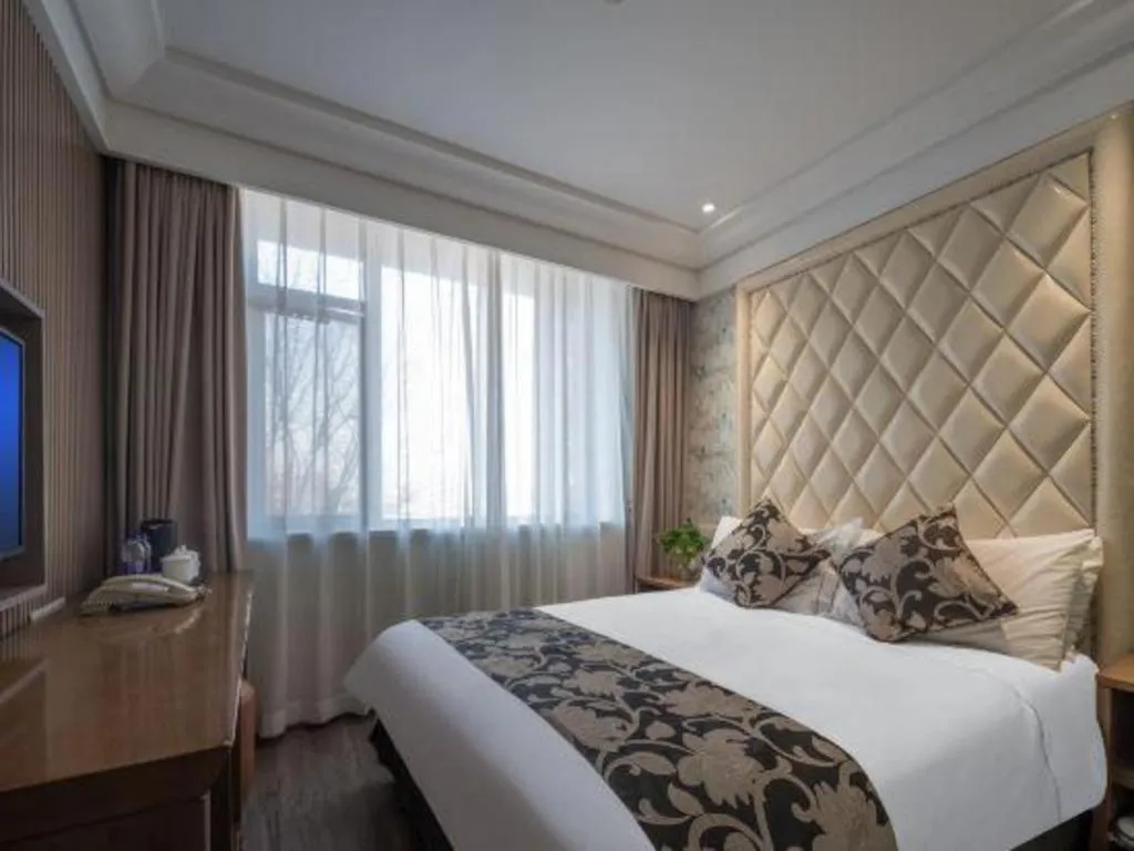 Bed in Nanjing Grand Da Qiao Hotel