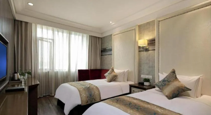 Bed in Nanjing Grand Da Qiao Hotel