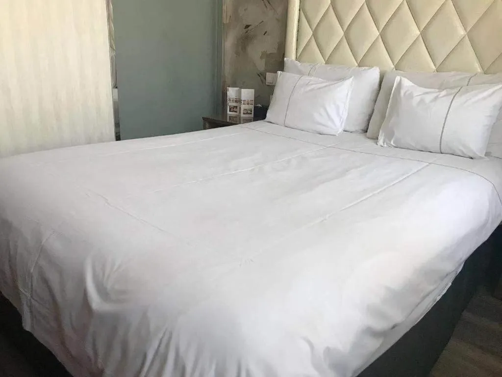 Bed in Nanjing Grand Da Qiao Hotel