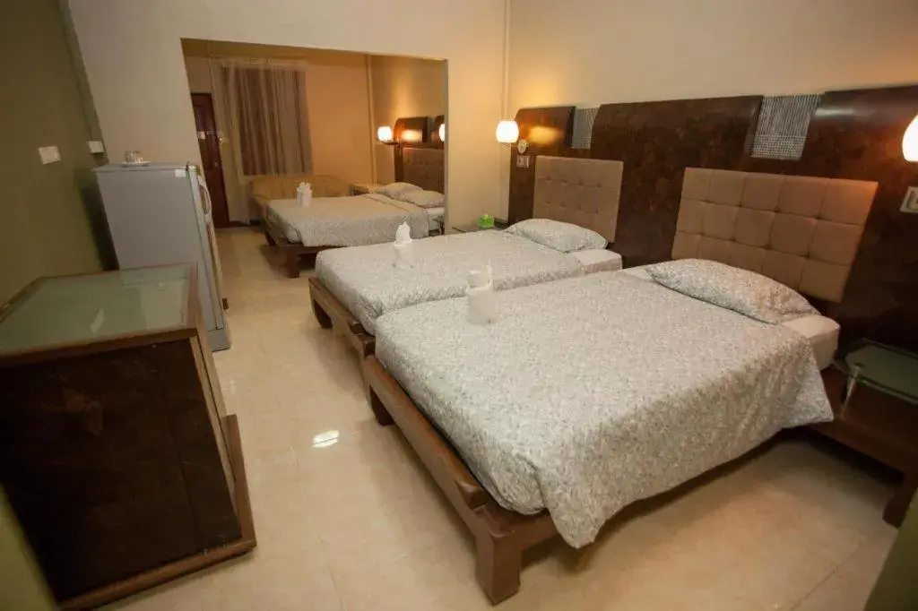 Bed in Lotusland Resort Bed in Lotusland Resort