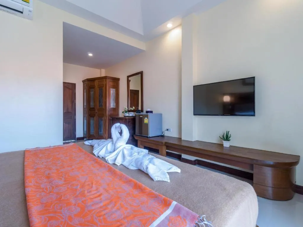 Bed in Lotusland Resort