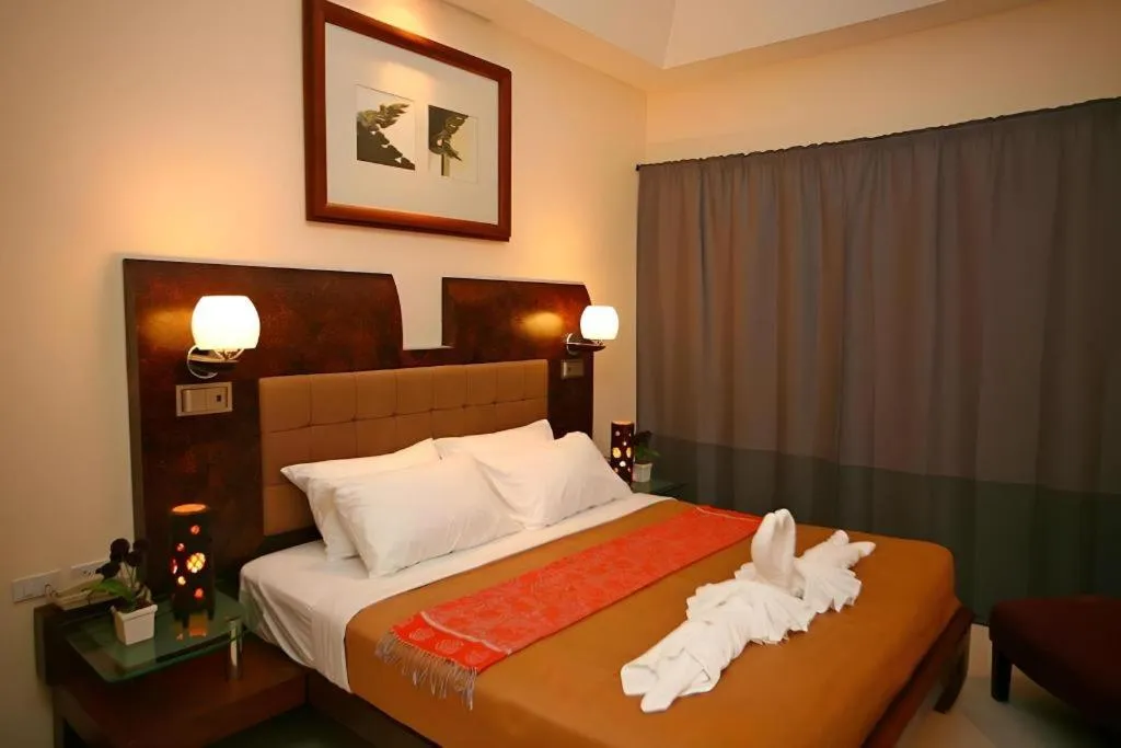 Bed in Lotusland Resort