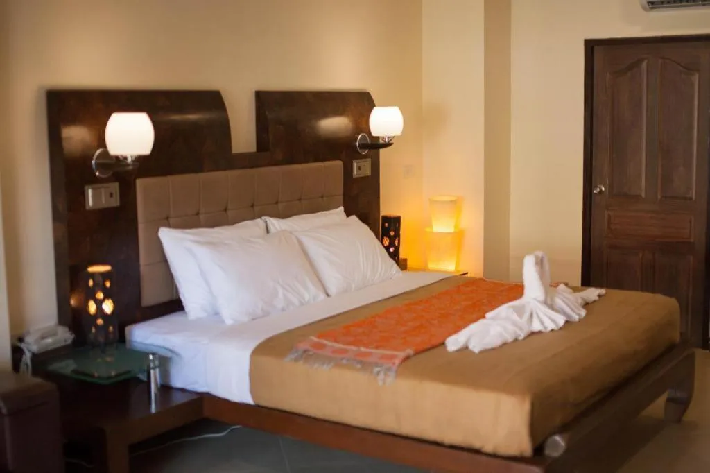 Bed in Lotusland Resort