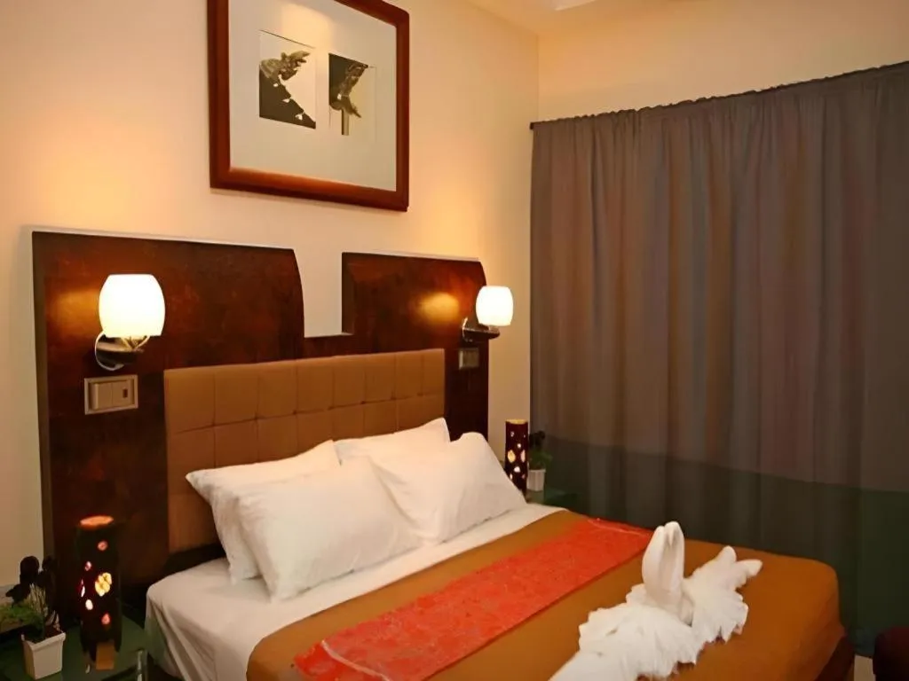 Bed in Lotusland Resort