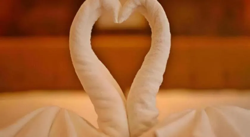 Bed in Lotusland Resort