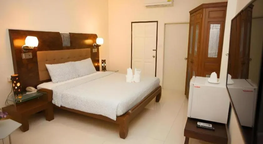 Bed in Lotusland Resort