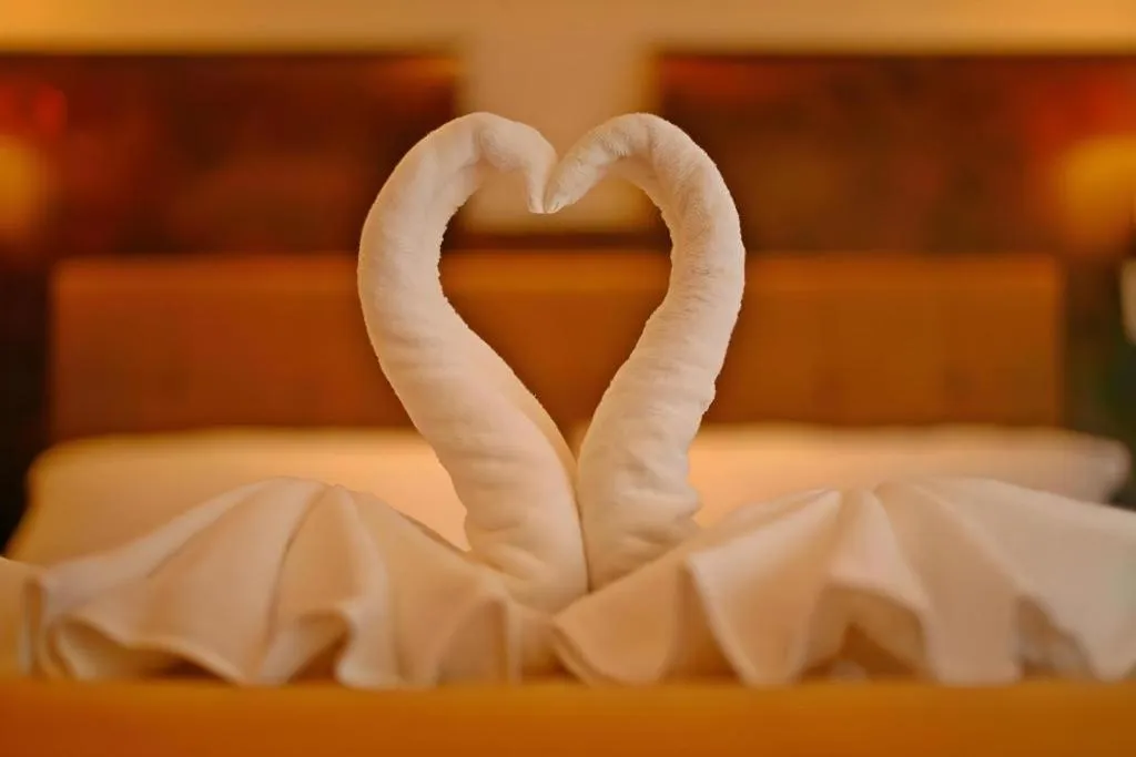 Bed in Lotusland Resort