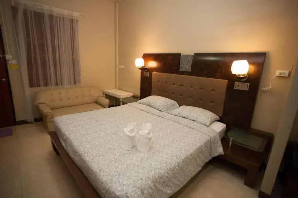 Bed in Lotusland Resort Bed in Lotusland Resort