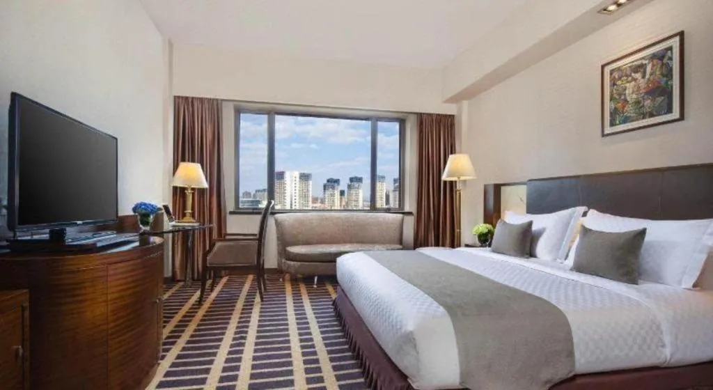 Bed in Kunming Jinjiang Hotel