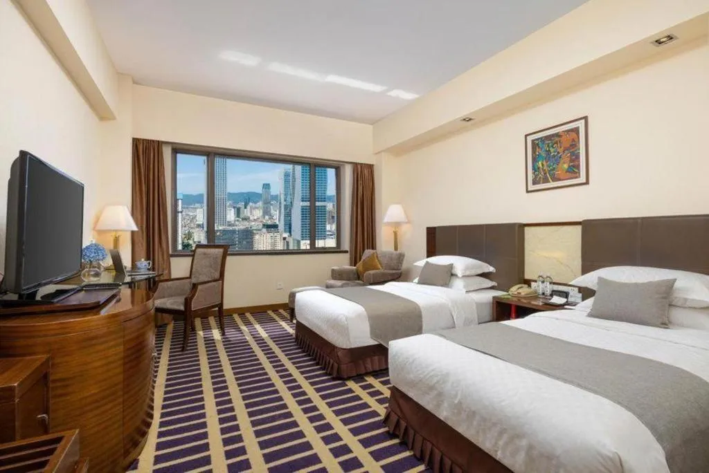 Bed in Kunming Jinjiang Hotel