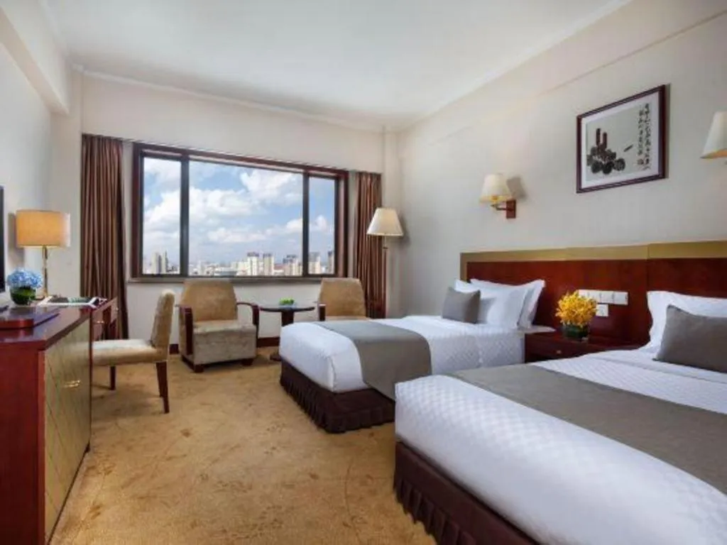 Bed in Kunming Jinjiang Hotel