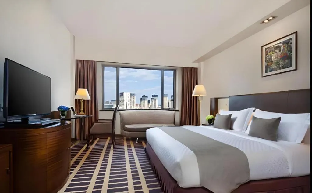 Bed in Kunming Jinjiang Hotel